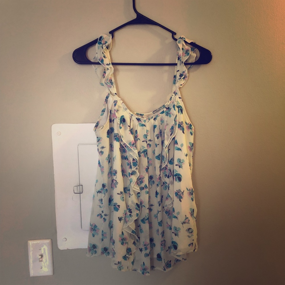 White ruffled tank